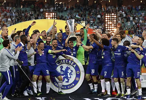 Chelsea's Pedro Rodriguez, center, holds the trophy after winning the Europa League Final soccer match between Chelsea and Arsenal at the Olympic stadium in Baku, Azerbaijan. (Photo | AP)