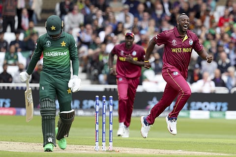 West Indies' Andre Russell celebrates bowling Pakistan's Fakhar Zaman during their Cricket World Cup match at Trent Bridge cricket ground in Nottingham. (Photo | AFP)