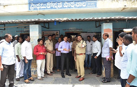 Guntur district collector K Sasidhar with urban SP Ch Vijaya Rao inspecting arrangements at 244 polling booth to conduct repolling on May 6 at Nallacheruvu of Guntur west on Friday | Express