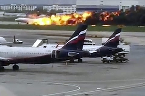 This image taken from video provided by Instagram user @artempetrovich, shows the SSJ-100 aircraft of Aeroflot Airlines on fire during an emergency landing in Sheremetyevo airport in Moscow, Russia. (Photo | AP)