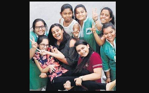 Students celebrate the results in New Delhi on Monday | shekhar yadav