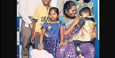 Three-year-old Radhesh with his family and a team of doctors from Apollo Hospital (Photo | Debadatta Mallick)