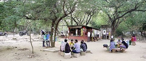 Students relaxing at a dhaba inside Jawaharlal Nehru University in Delhi. The campus has seen a lot of protests by students in recent years (Photo | Shekhar Yadav/EPS)