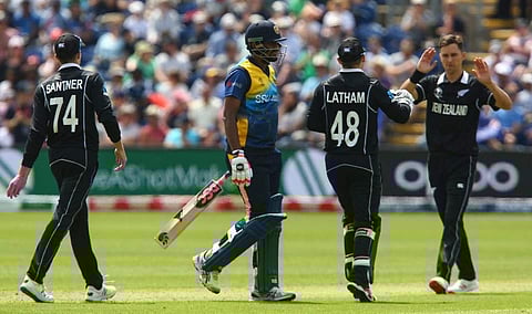 Sri Lanka's Suranga Lakmal (C) reacts as he walks back to the pavilion after his dismissal during the 2019 Cricket World Cup group stage match between New Zealand and Sri Lanka. (Photo | AFP)