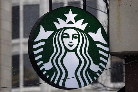 Starbucks logo on a shop in downtown Pittsburgh. (Photo | AP)