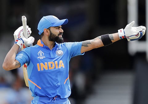 India's captain Virat Kohli gestures during the Cricket World Cup match between India and Australia. (Photo | AP)