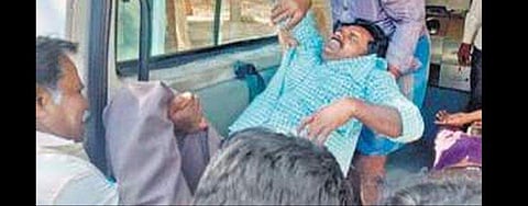 One of the injured revenue officials at Kadap government hospital. (Photo | EPS)