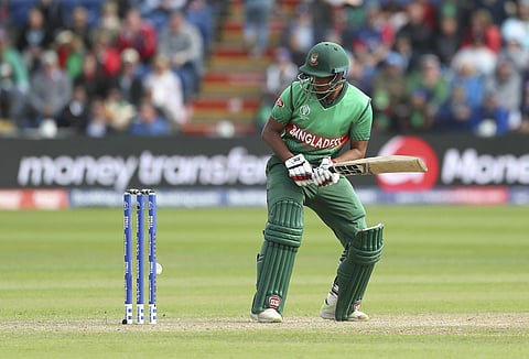 Bangladesh's Mohammad Saifuddin watches as the ball hits the wicket but the bails stay onduring the ICC Cricket World Cup group stage match between England and Bangladesh at the Cardiff Wales Stadium. (Photo | AP)