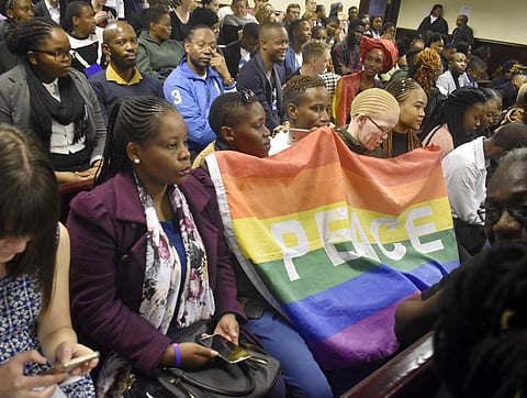 Activists sit in a courtroom to wait the decision by the High Court in Gaborone, Botswana (Photo | AP)