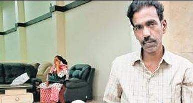 Nazir, a resident of KG Halli, shows his investment document