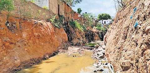 The trench that GHMC had dug at Shah Hatim Talab, near Golconda Fort, in Hyderabad. (Photo | EPS)
