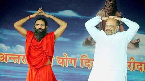 Union Home Minsiter Amit Shah with Baba Ramdev. (File| PTI)