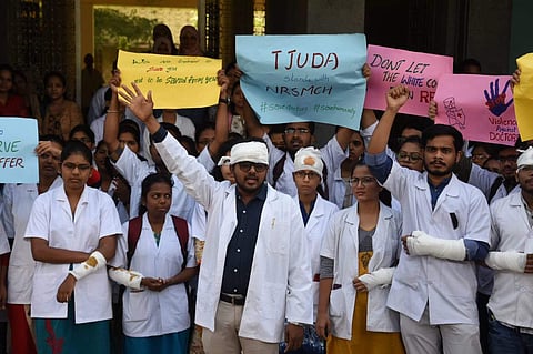 Telangana junior doctors at Gandhi Medical College protest aganist attack on West Bengal doctors . (Photo | R V K Rao.)