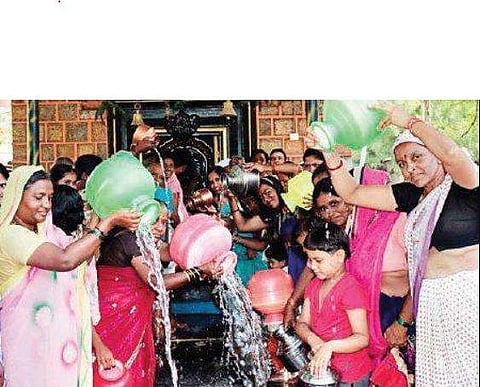 The women performing pooja at the temple in Gadag district | express