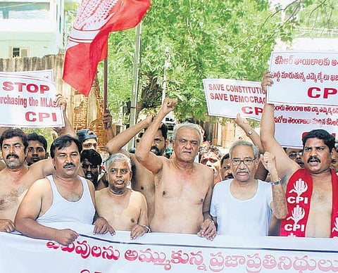 CPI members stage shirtless protest against the defection of MLAs in Hyderabad. (Photo | Sathya Keerthi, EPS)