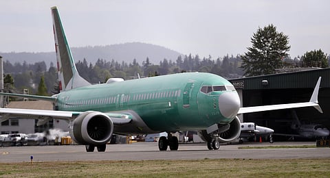 In this May 8, 2019, file photo a Boeing 737 MAX 8, being built for American Airlines, makes a turn on the runway as it is readied for takeoff on a test flight in Renton, Wash. | AP