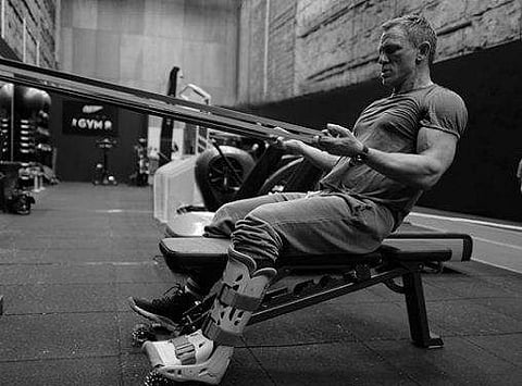 Daniel Craig works out in the gym with an injured leg (Photo| Twitter/ @007)