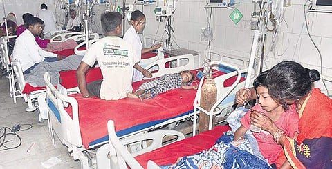 Children showing symptoms of Acute Encephalitis Syndrome being treated at a hospital in Muzaffarpur, Bihar, on Saturday | PTI