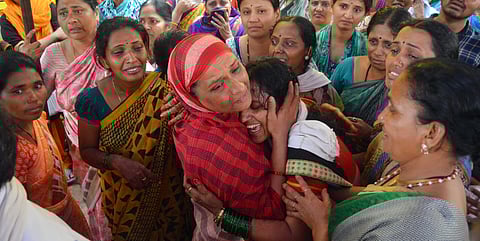 Omkar's mother breaks down at her residence in Hubballi on Friday after mortal remains of her son arrives. (Photo | D Hemanth, EPS)