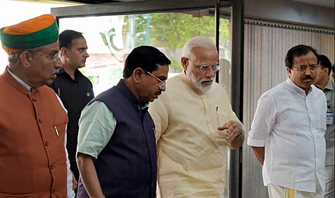 Prime Minister Narendra Modi along with Minister of Parliamentary Affairs Pralhad Joshi, Arjun Ram Meghwal and other leaders arrive to attend an all-party meeting at PLB ahead of the 17th Lok Sabha session New Delhi Sunday June 16 2019. | PTI
