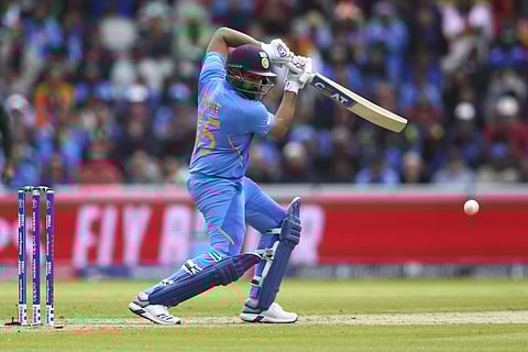 Rohit Sharma plays a shot against Pakistan. (Photo | AP)