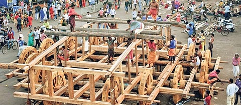 Carpenters working on a chariot in Puri on Sunday. (Photo| EPS)