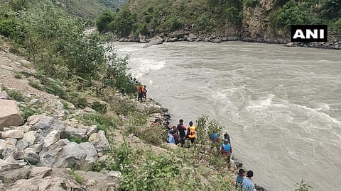 Fifteen people are missing after a crowded jeep plunged into the river. (Photo | ANI)