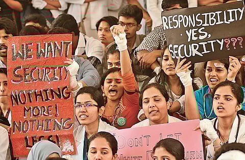 Doctors stage protest in their counterparts in Kolkata. (Photo | EPS)