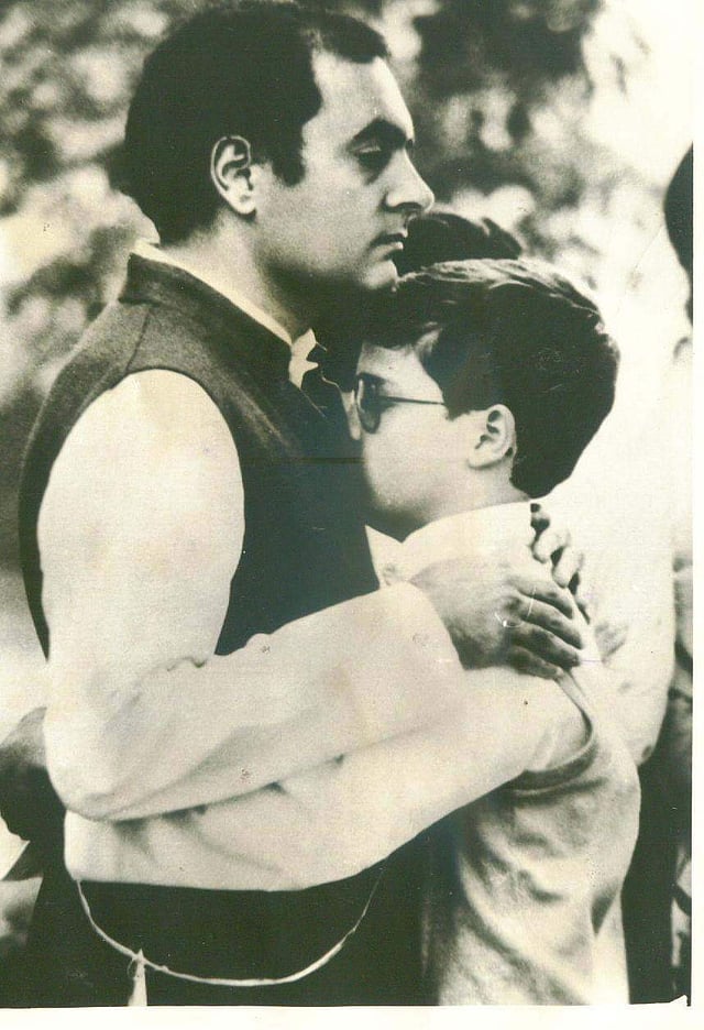 Rahul hugging his father Rajiv Gandhi, former Prime Minister of India. (Express Photo)