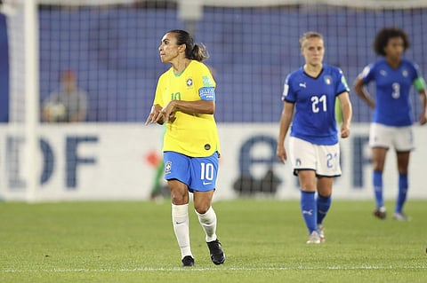 Brazil's Marta, left, celebrates after scoring her side's first goal with a penalty kick during the Women's World Cup Group C soccer match between Italy and Brazil at the Stade du Hainaut in Valenciennes, France. (Photo | AP)
