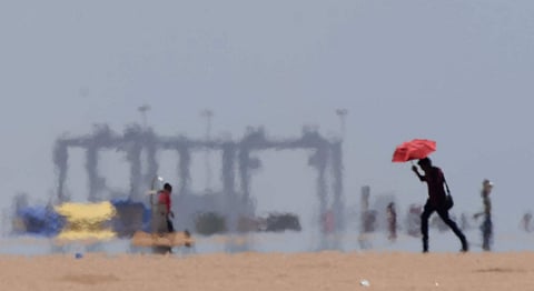 Visitors at Marina Beach in Chennai on Tuesday as the city suffers a prolonged heatwave that has lasted two weeks now. (Photo | R satish Babu, EPS)