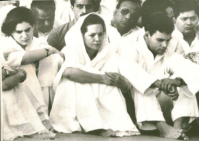 Sonia is seen attending the funeral of her husband Rajiv Gandhi with her son Rahul and Priyanka. (Express Photo)