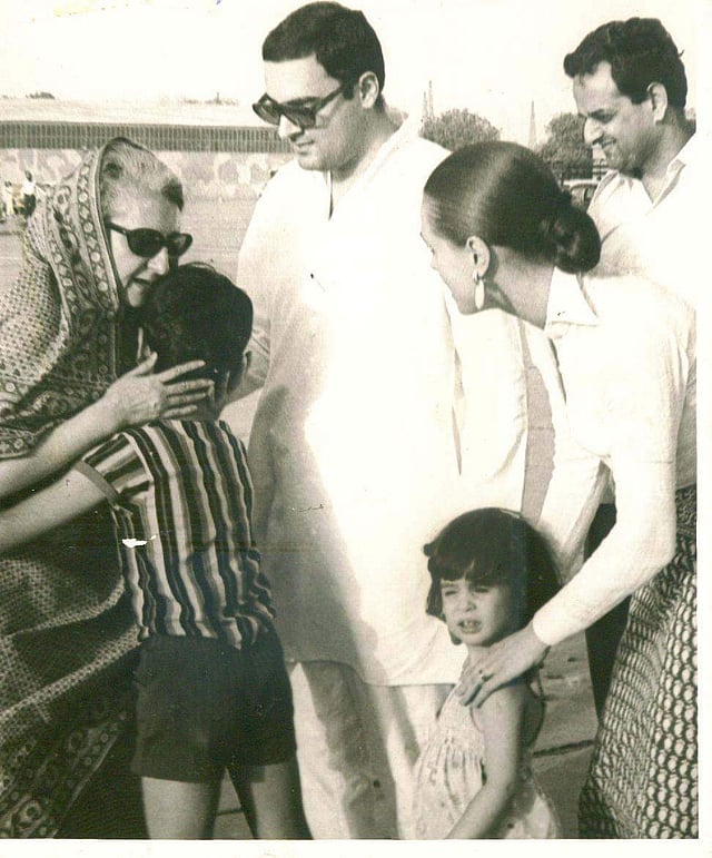 Indira Gandhi kissing her grandson Rahul. Also seen are Former Prime Minister Rajiv Gandhi with Sonia and daughter Priyanka. (Express Photo)