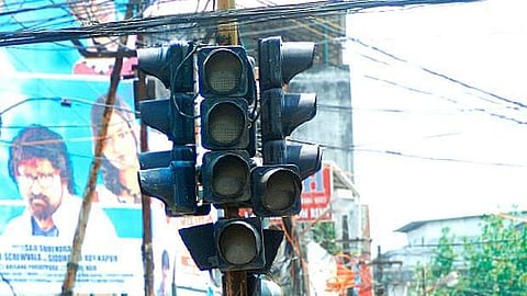 A black sedan car had jumped the signal at the junction, took a sharp turn towards ISB main road hitting three people.