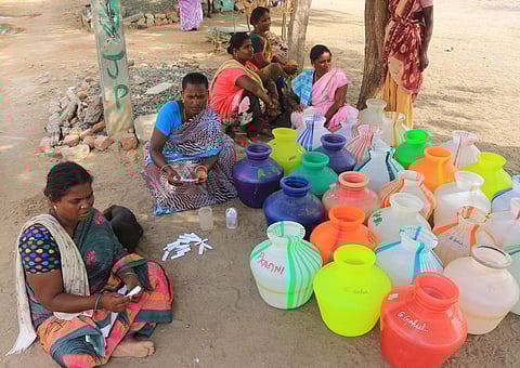 Women in Tamil Nadu's Ramanathapuram district are seen waiting according to their lot numbers. | Express Photo Services