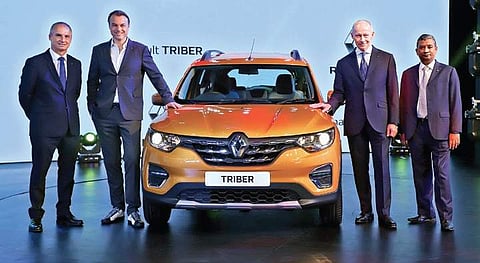(R-L) Venkatram Mamillapalle, India CEO & MD alongside Groupe Renault CEO Thierry Bolloré and EVP Laurens van den Acker unveiling the new Triber | Express