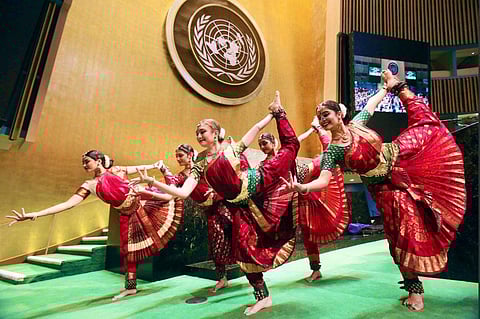 Women perform an yogasana inside the UN General Hall on 'International Yoga Day' (Photo| Twitter/ Syed Akbaruddin)