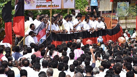 DMK cadets stage protest against state Government failed in drinking water crisis in Tiruchy. (Photo | MK Ashok Kumar, EPS)