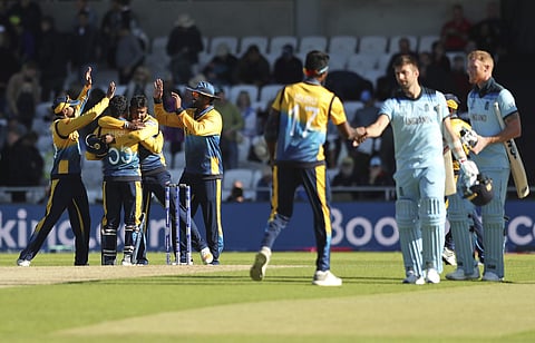 Sri Lankan cricketers celebrate after winning the Cricket World Cup match against England in Leeds, England. (Photo | AP)