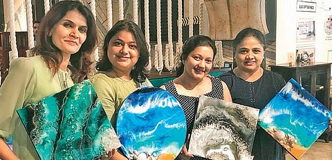 Artists with their resin creations at Paint’n’Clay Studio