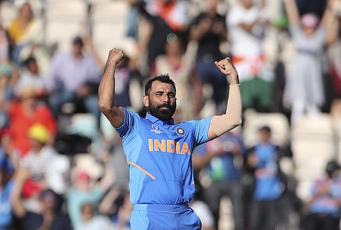India's Mohammed Shami celebrates his hat-trick after dismissing Afghanistan's Mujeeb Ur Rahman. (Photo | AP)