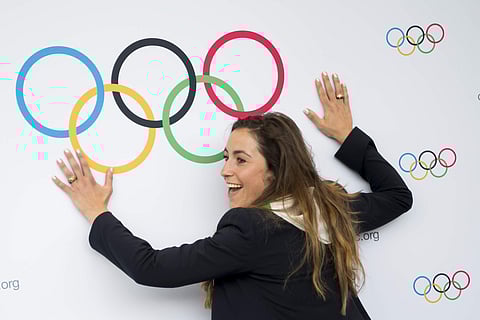 Italian skier Sofia Goggia smiles after International Olympic Committee (IOC) president Thomas Bach from Germany announced that Milan-Cortina has won the bid to host the 2026 Winter Olympic Games, during the first day of the 134th Session of the Internati