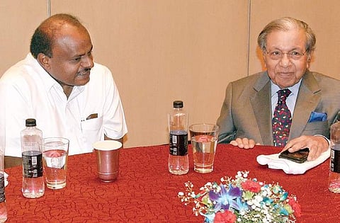 Chairman of 15th Finance Commission of India N K Singh with Chief Minister H D Kumaraswamy during a meeting in Bengaluru onTuesday | NAGARAJA GADEKAL