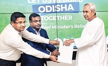 SP group presents their donation for Fani-hit areas to Odisha CM Naveen Patnaik