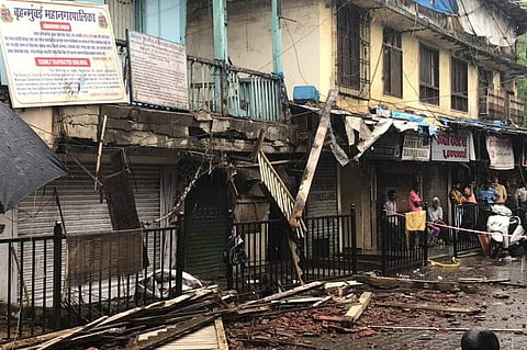 A portion of a building collapsed near Kurla Station (West) on Saturday. (Photo | Twitter/ANI)