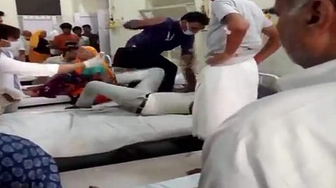 A resident doctor beat up a patient in Sawai Man Singh (SMS) Medical College in Jaipur, Rajasthan. (Photo | ANI Twitter)