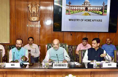 Home minister Amit Shah at a review meeting with MHA official ( Photo | Twitter/@HMOIndia)