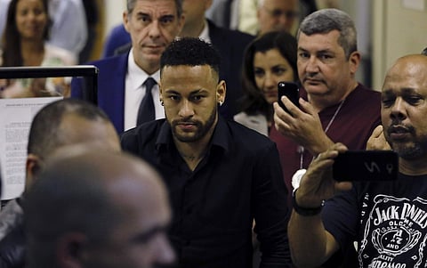Neymar leaves police headquarters in Rio de Janeiro, Brazil. (Photo | AP)
