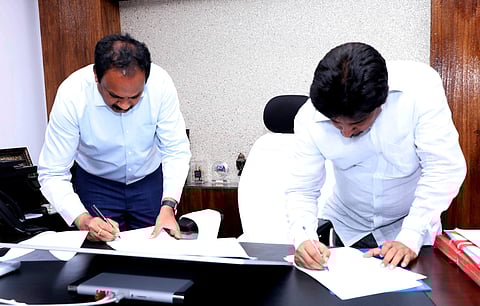 P Lakshmi Narasimham takes charge as CRDA commissioner and Cherukuri Sridhar relieved in CRDA office at Lenin center in Vijayawada on Thursday | Express