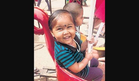 Kids enjoy the toy train ride at Kidwai Memorial Institute of Oncology.